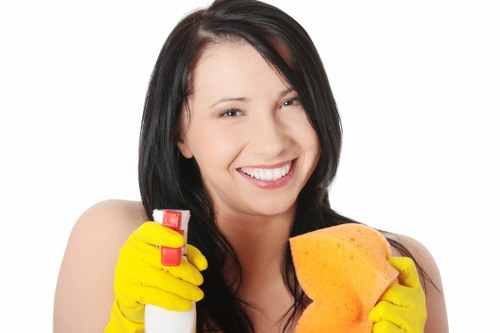 Cleaner working in a shared office and communal space