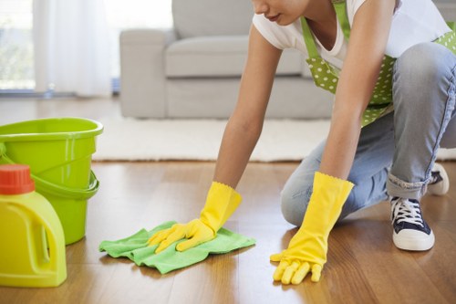 Local cleaners maintaining desks and shared spaces in SW16